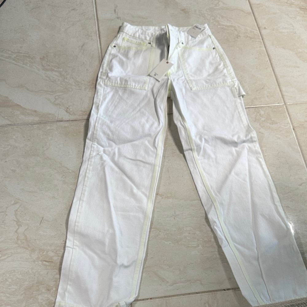 Good American White Carpenter Jeans with Neon Yellow Stitching